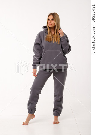 Sporty blonde girl in thermal clothing for women Sporty blonde girl in thermal clothing for women 99533481