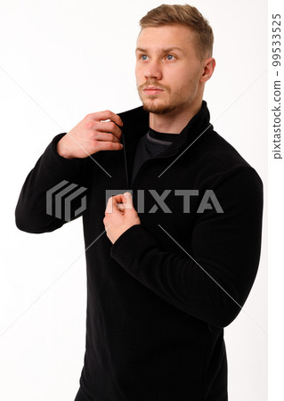 A man with a sporty physique in thermal underwear. 99533525