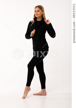 Sporty blonde girl in thermal clothing for women - Stock Photo