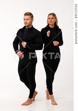 Sports family, husband and wife in thermal clothes. Sports family, husband and wife in thermal clothes. 99533592