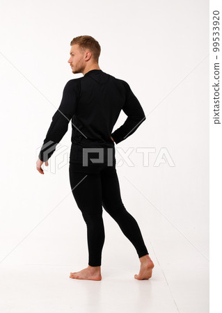 A man with a sporty physique in thermal underwear. 99533920