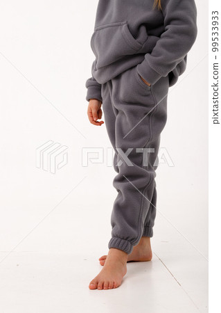 Little girl in thermal clothes, on a white background. Little girl in thermal clothes, on a white background. 99533933