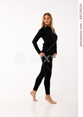 Sporty blonde girl in thermal clothing for women Sporty blonde girl in thermal clothing for women 99534029