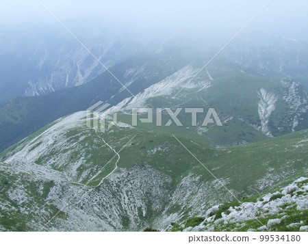 tourists travel in the mountains. hiking in the mountains. People traveling tourists travel in the mountains. hiking in the mountains. People traveling 99534180