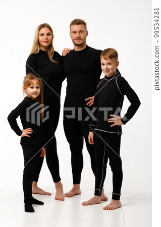 Sports family in thermal clothes, on a white background. 99534281