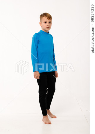 A little girl and her older brother in thermal clothes. 99534359