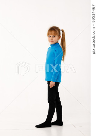 A little girl and her older brother in thermal clothes. A little girl and her older brother in thermal clothes. 99534467