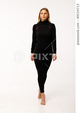 Sporty blonde girl in thermal clothing for women 99534713