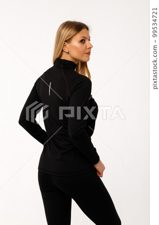 Sporty blonde girl in thermal clothing for women Sporty blonde girl in thermal clothing for women 99534721