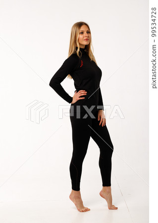 Sporty blonde girl in thermal clothing for women Sporty blonde girl in thermal clothing for women 99534728