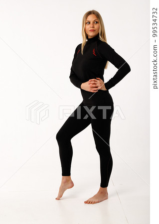 Sporty blonde girl in thermal clothing for women 99534732