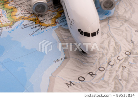 Passenger plane on a map highlighting Rabat, Morocco through selective focus, background blur. High quality photo Passenger plane on a map highlighting Rabat, Morocco through selective focus, background blur. High quality photo 99535834