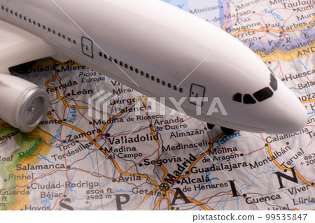 Passenger plane on a map highlighting Rome, Italy through selective focus, background blur. High quality photo Passenger plane on a map highlighting Rome, Italy through selective focus, background blur. High quality photo 99535847