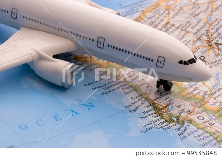 Close up of map with miniature passenger plane highlighting Lisbon, Portugal through selective focus, shallow depth of field, background blur. High quality photo Close up of map with miniature passenger plane highlighting Lisbon, Portugal through selective focus, shallow depth of field, background blur. High quality photo 99535848