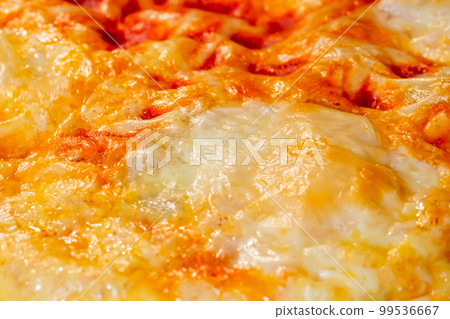 Baked homemade pizza Margherita in electric oven at home: close up Baked homemade pizza Margherita in electric oven at home: close up 99536667