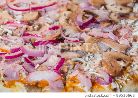 Uncooked homemade pizza in electric oven: close up Uncooked homemade pizza in electric oven: close up 99536668
