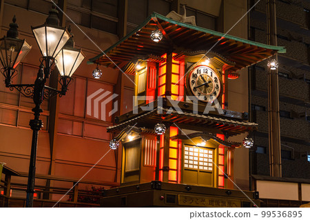 Botchan Karakuri Clock illuminated in front of Dogo Onsen Station in Matsuyama City, Ehime Prefecture, Japan 99536895