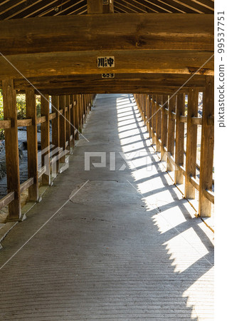 Corridor of Kibitsu Shrine in Kibitsu, Kita Ward, Okayama City, Japan Corridor of Kibitsu Shrine in Kibitsu, Kita Ward, Okayama City, Japan 99537751