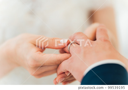 Bride and groom exchanging rings at the wedding hall (wedding, wedding, bridal) 99539195