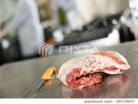 Raw fresh mutton meat lies on cutting table 99539647