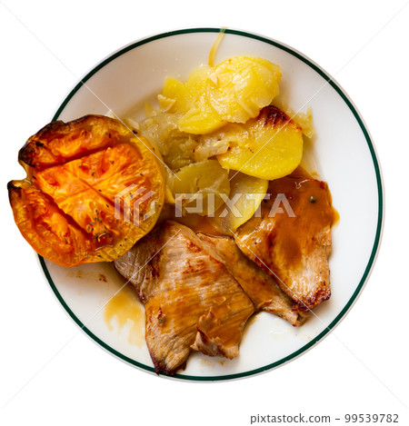 Pork with tomato and potato served on plate Pork with tomato and potato served on plate 99539782
