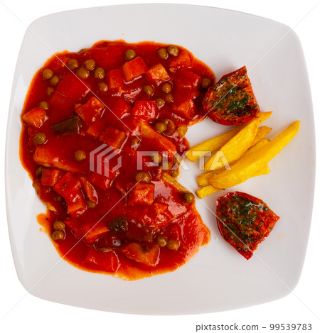 Tilapia fillet with vegetables, french fries and sun-dried tomatoes Tilapia fillet with vegetables, french fries and sun-dried tomatoes 99539783
