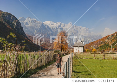 Tourist walking for sightseeing in european rural village. Tourist walking for sightseeing in european rural village. 99541374
