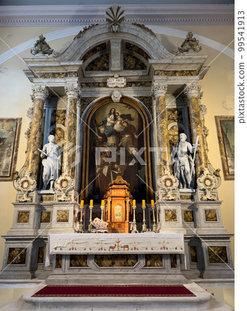 Catholic church altar with icons, statues and columns 99541913