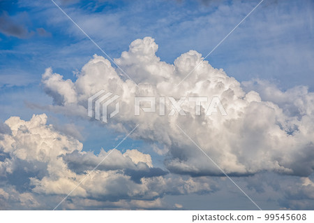 Cumulus clouds in the blue summer sky Cumulus clouds in the blue summer sky 99545608