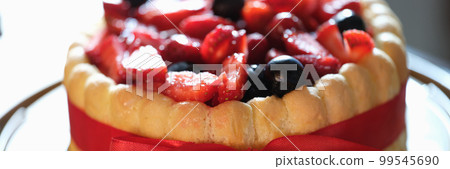 Fresh berry sweet fresh pie with red ribbon 99545690