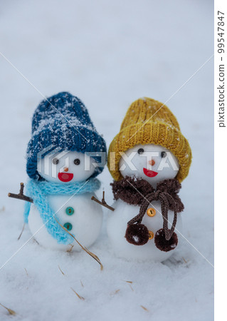 snowmen on snow 99547847
