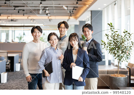 People working in a fashionable designer's office 99548120