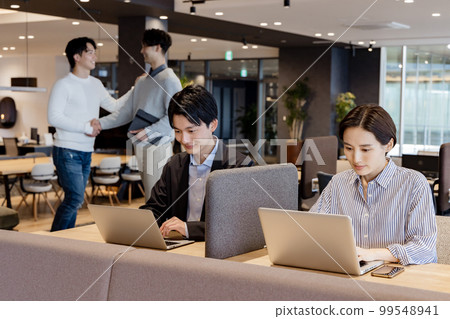 People working in a fashionable designer's office People working in a fashionable designer's office 99548941