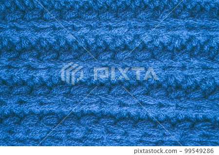 Handmade knit background with macro wool threads. Handmade knit background with macro wool threads. 99549286