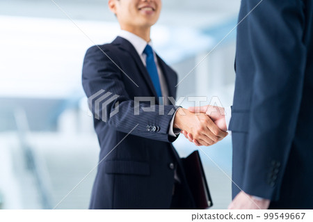 Handshake business negotiation business businessman office meeting conference Handshake business negotiation business businessman office meeting conference 99549667