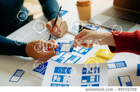 UX graphic designer planning application process development prototype wireframe for web smart phone. Creative digital development agency.. UX graphic designer planning application process development prototype wireframe for web smart phone. Creative digital development agency.. 99550789