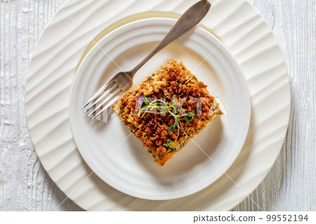 Tasty Strata with meat, mushrooms, cheese, onion 99552194