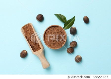 Concept of spices and condiments, nutmegs, top view Concept of spices and condiments, nutmegs, top view 99554663