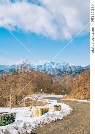 A view of the Northern Alps from the Rindo Highway [Ooka, Nagano City] 99555389