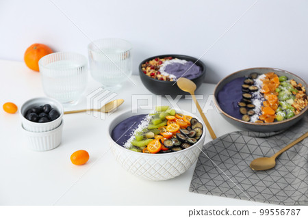 Concept of healthy food with acai smoothie Concept of healthy food with acai smoothie 99556787