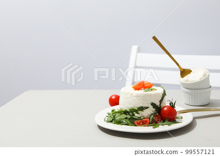 Concept of tasty dairy product - ricotta cheese, space for text Concept of tasty dairy product - ricotta cheese, space for text 99557121