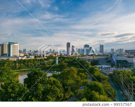Green tree forest public park with city office building Green tree forest public park with city office building 99557567