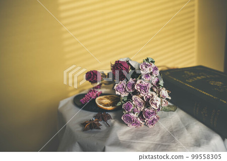 Yellow background and dried flowers and interior accessories Yellow background and dried flowers and interior accessories 99558305