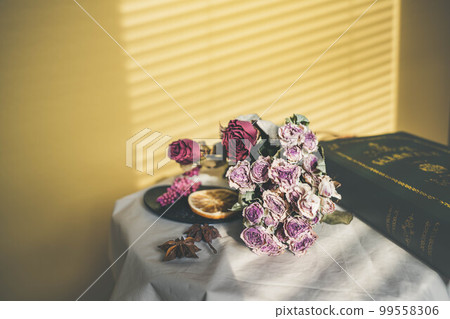 Yellow background and dried flowers and interior accessories 99558306