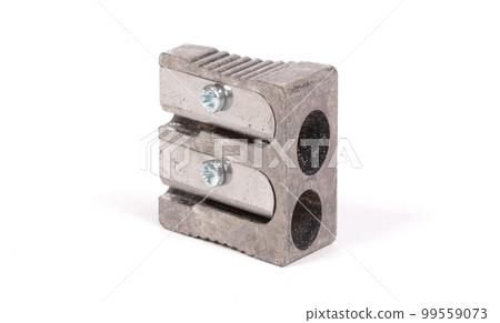 Old manual metal pencil sharpner on white background Old manual metal pencil sharpner on white background 99559073