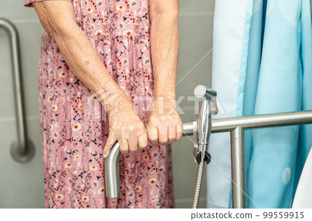 Asian senior or elderly old lady woman patient use toilet bathroom handle security in nursing hospital, healthy strong medical concept. Asian senior or elderly old lady woman patient use toilet bathroom handle security in nursing hospital, healthy strong medical concept. 99559915