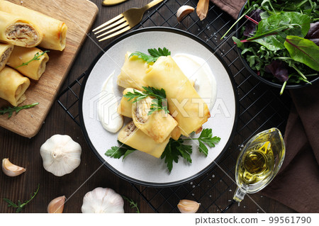 Concept of tasty food, thin pancakes with filling, top view 99561790