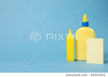 Concept of different office stationery with glue 99561801