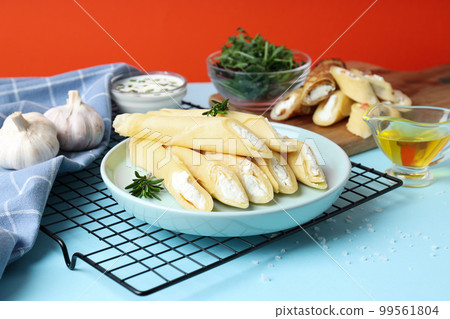 Concept of tasty food, thin pancakes with filling 99561804