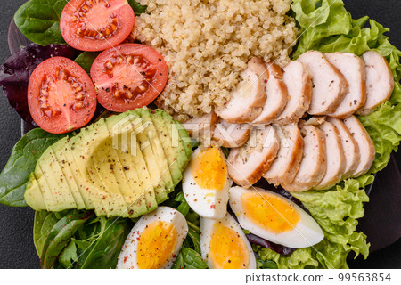 Delicious healthy lunch consisting of chicken, avocado, quinoa, eggs and tomatoes Delicious healthy lunch consisting of chicken, avocado, quinoa, eggs and tomatoes 99563854